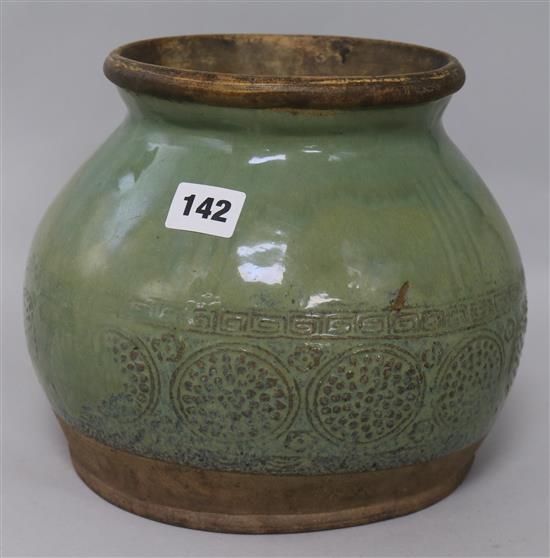 A 19th century Celadon Shiwan green glazed pottery jar H.20cm